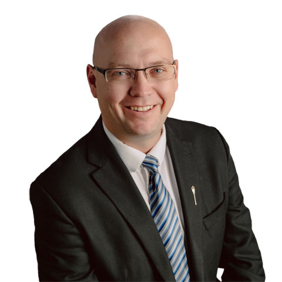 Minister Searle Turton